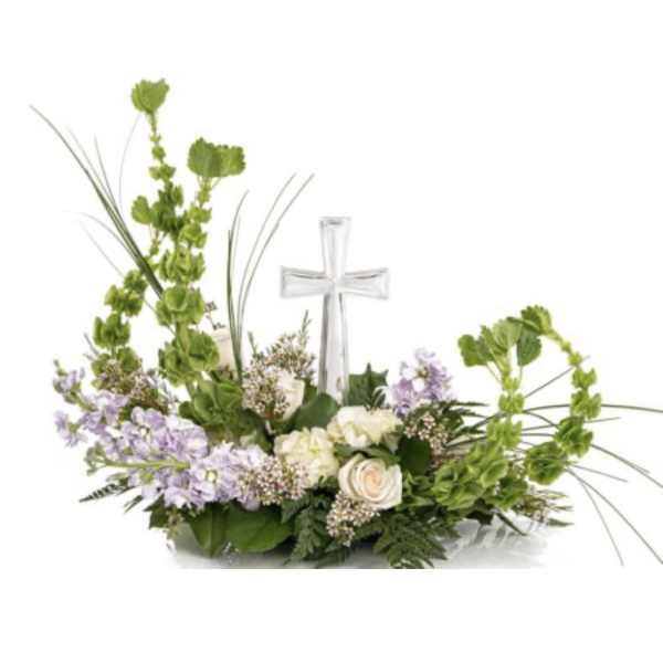 White and lavender floral arrangement with a clear cross centerpiece
