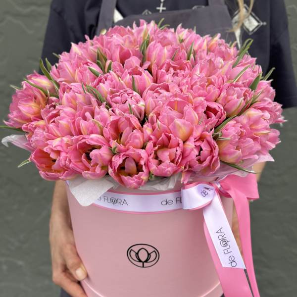 Large pink tulip bouquet in a round pink box with ribbon