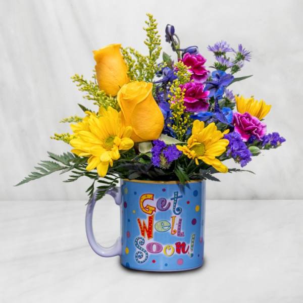 Colorful flower bouquet in a blue mug with "Get Well Soon" text