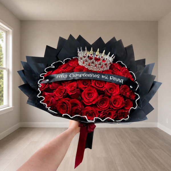 Large bouquet of red roses with a crown and black wrap
