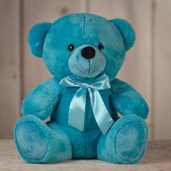 Blue teddy bear with a satin ribbon bow