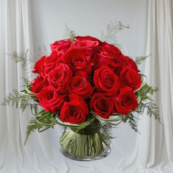 Red rose bouquet in a clear glass vase
