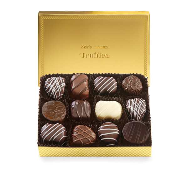 Box of assorted chocolate truffles in a gold gift box