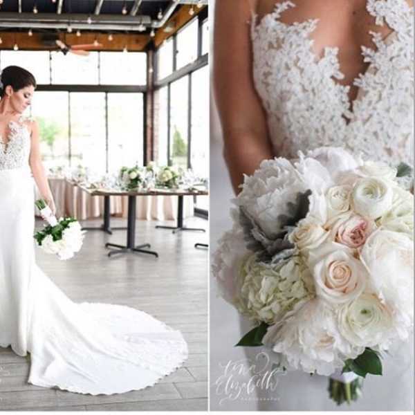 Bride holding a white wedding bouquet of roses and hydrangeas