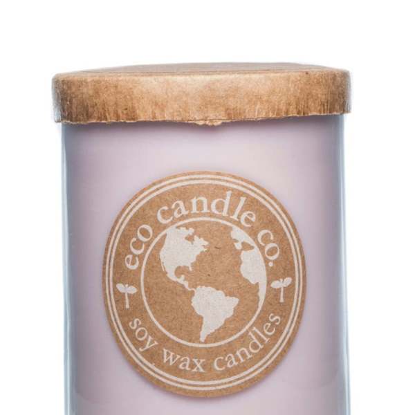 Lavender soy wax candle in a glass jar with a wooden lid