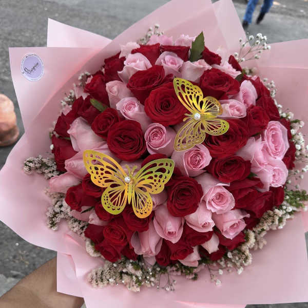 ramo bouchon de rosa y maripoza By Special Moment´S