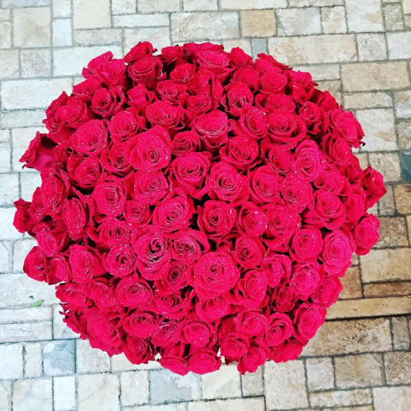 Large round bouquet of red roses