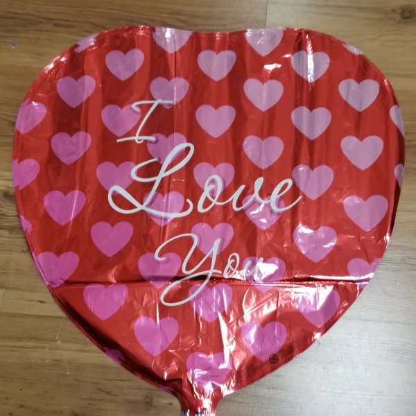 Heart-shaped red balloon with pink hearts and the words "I Love You"