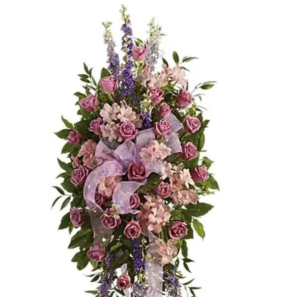 Tall floral spray with pink roses and lavender ribbon