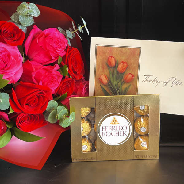 Red and pink roses with a Ferrero Rocher box and a thinking of you card