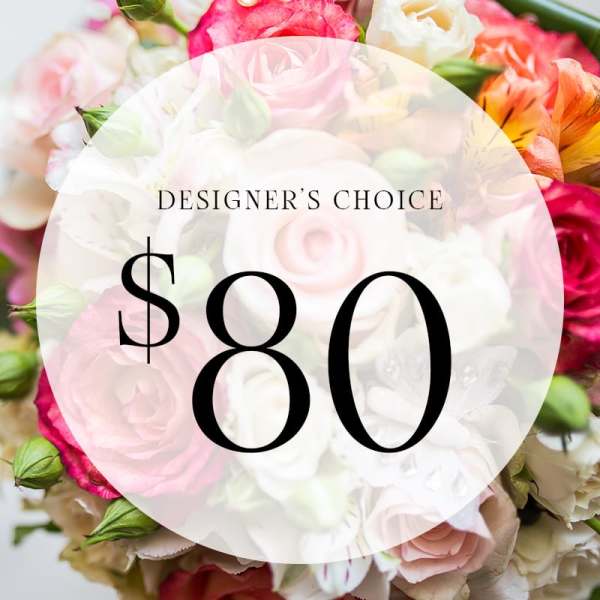 Mixed bouquet of pink, white, and orange flowers with an $80 label