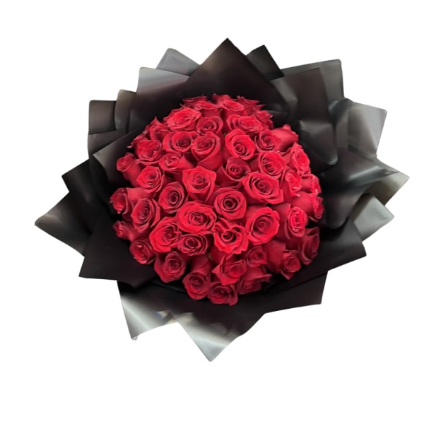 Bouquet of red roses wrapped in black paper
