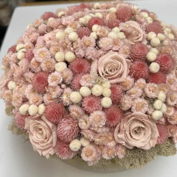 Round bouquet of blush and pink flowers with pale roses