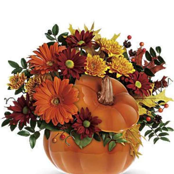 Pumpkin-shaped vase with orange and burgundy flowers