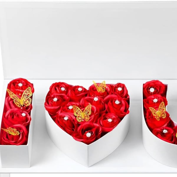 Red rose gift boxes arranged to spell I love you