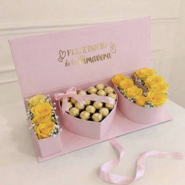 Pink gift box with yellow roses and chocolates