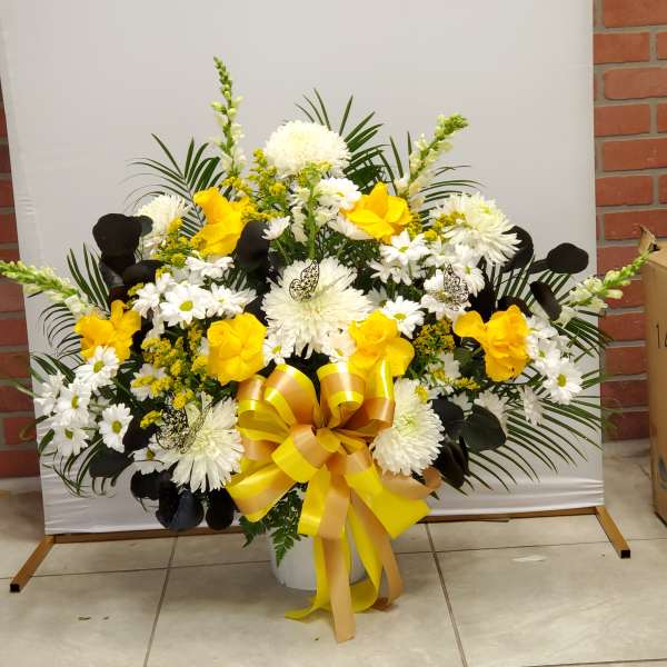 Yellow, white and black floor basket
