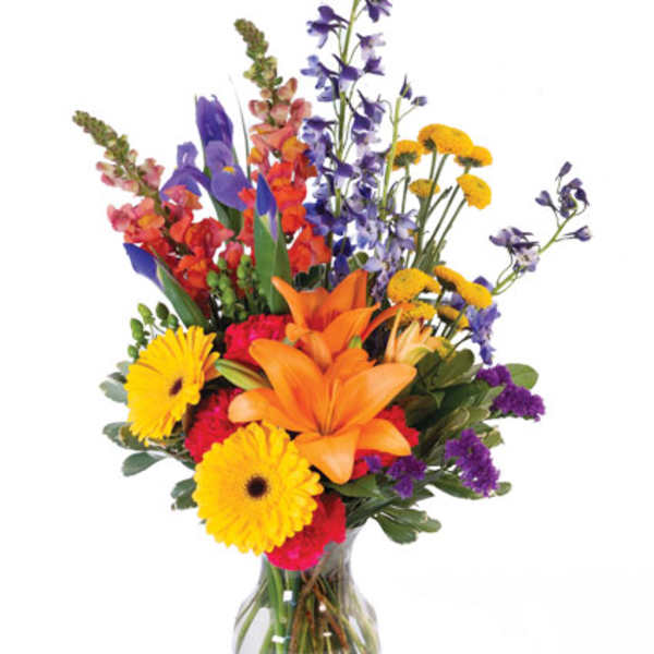 Colorful mixed bouquet in a clear glass vase
