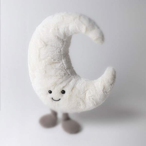 Plush crescent moon with a smiling face and small feet