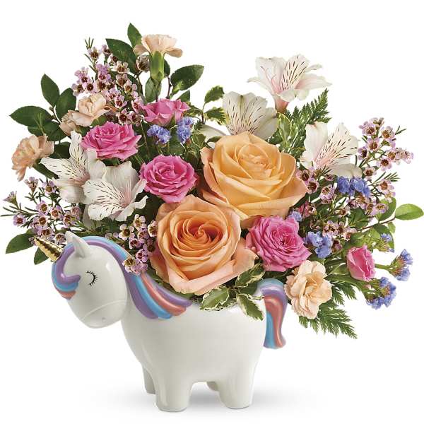 Bouquet of roses and alstroemeria in a unicorn-shaped ceramic container