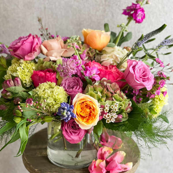 Colorful mixed bouquet in a clear glass vase