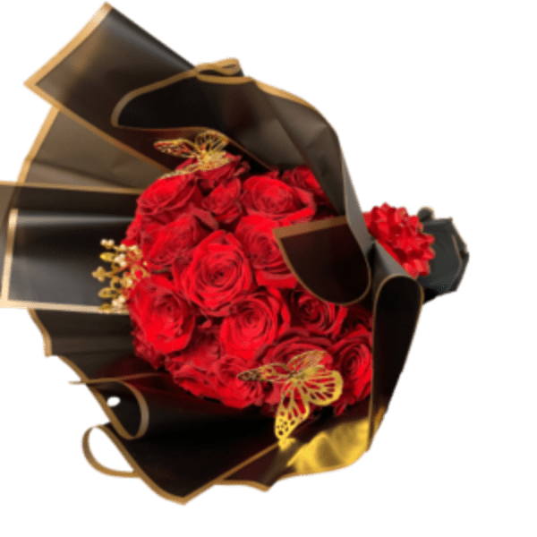Bouquet of red roses wrapped in black paper with gold accents