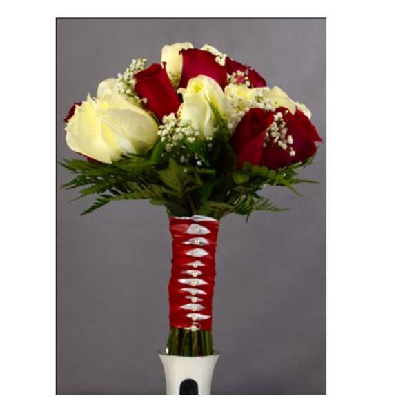 Bouquet of red and white roses with baby's breath in a wrapped handle
