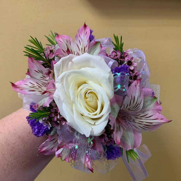White rose bouquet with pink striped alstroemeria and purple accents