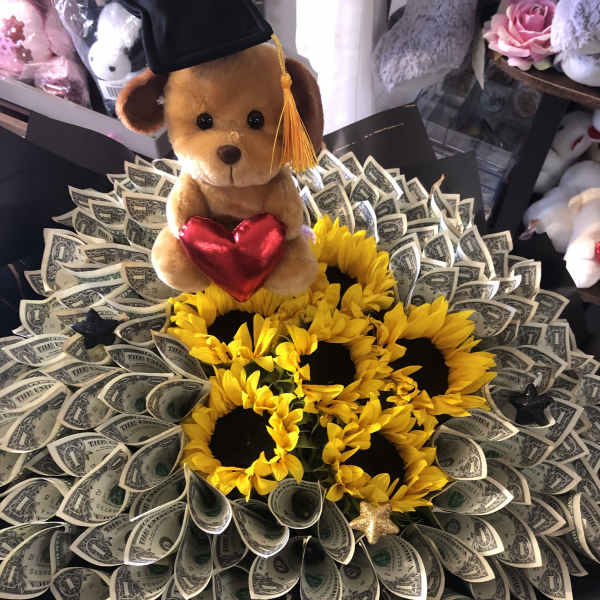 Sunflower bouquet with a teddy bear and dollar-bill wrapping