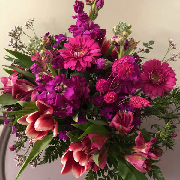 Bright pink and magenta bouquet with gerbera daisies and tulips