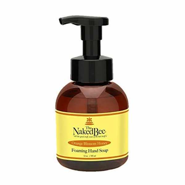 Bottle of foaming hand soap with a black pump and yellow label