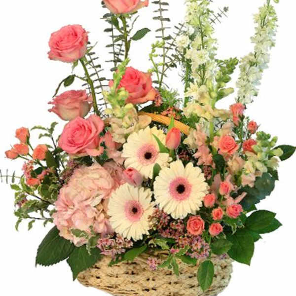 Basket arrangement of pink roses and white gerbera daisies