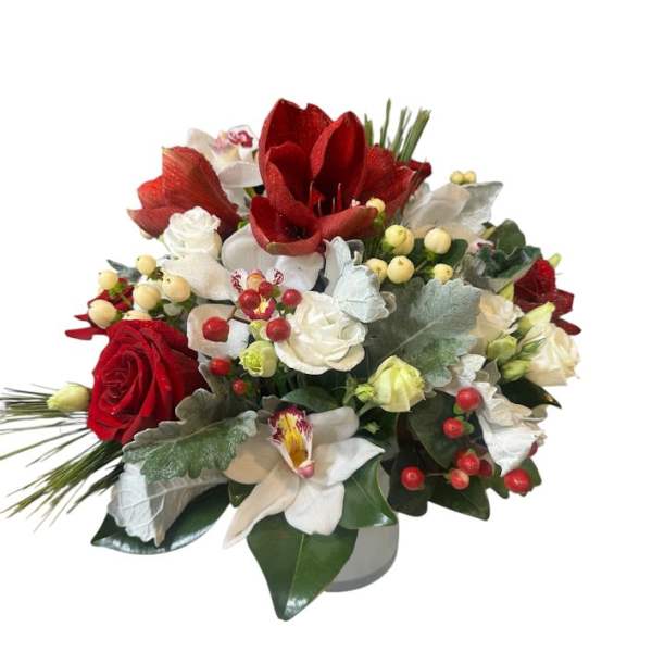 Red and white floral bouquet in a low vase