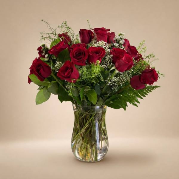 Bouquet of red roses in a clear glass vase