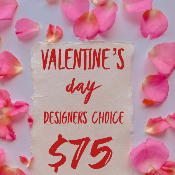 Pink rose petals around a Valentine’s Day sign with a $75 price