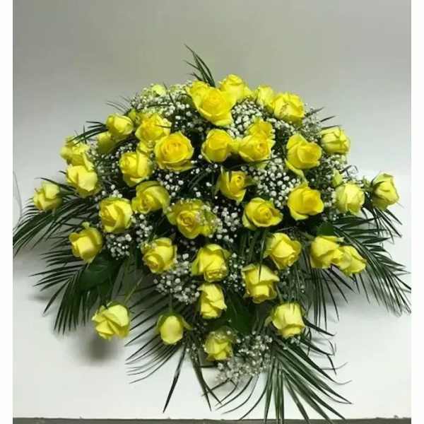 Yellow rose bouquet with baby's breath and palm fronds
