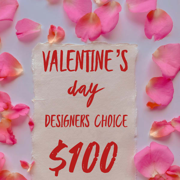 Pink rose petals around a Valentine’s Day sign with $100 text