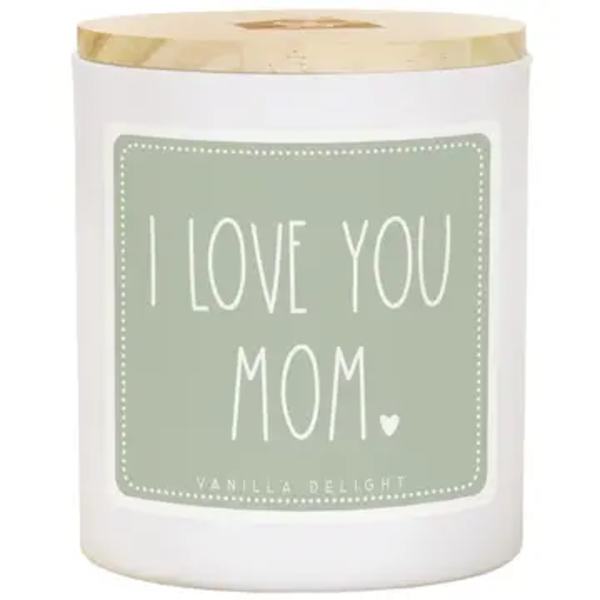White candle in a glass jar with a gold lid and "I LOVE YOU MOM" label