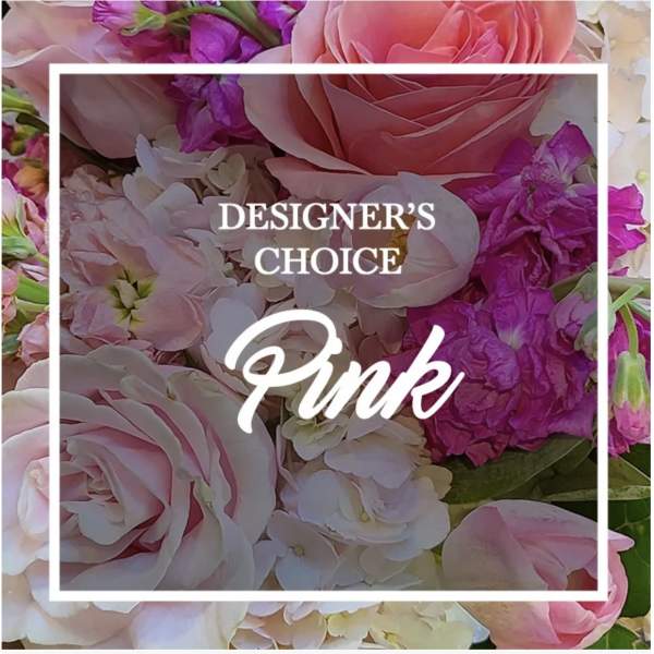 Pink and white flower arrangement with the words "Designer’s Choice Pink"