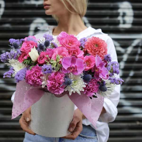 Pink and purple mixed bouquet in a white hatbox with ribbon