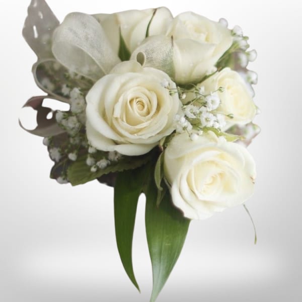White rose bouquet with baby's breath and green leaves