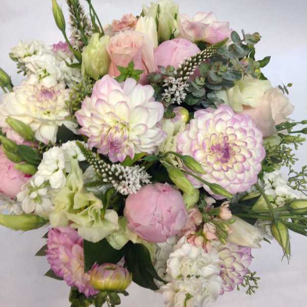 Pastel bouquet of pink and white flowers with eucalyptus