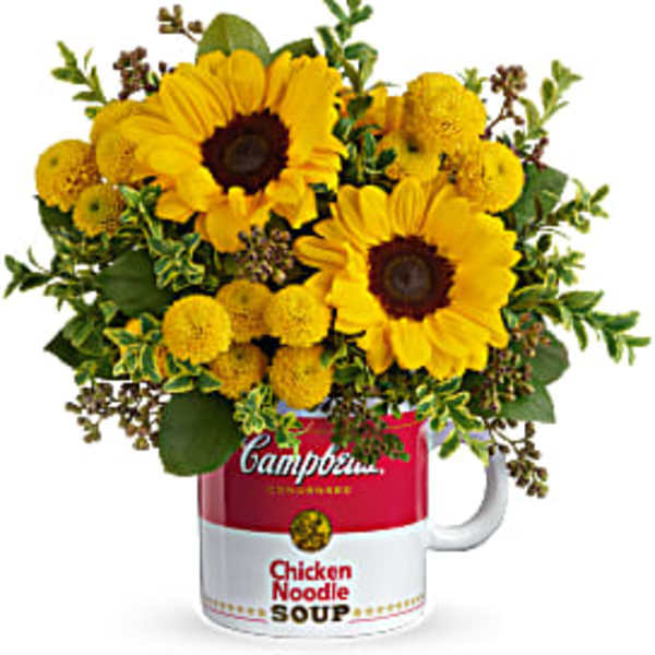 Sunflower bouquet arranged in a Campbell's soup mug