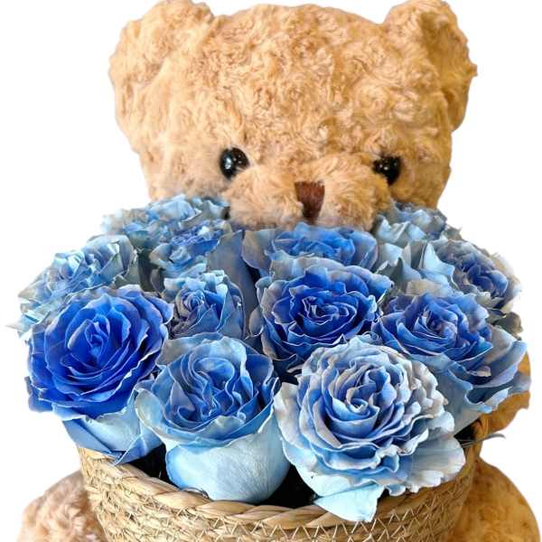 Teddy bear holding a basket of blue roses