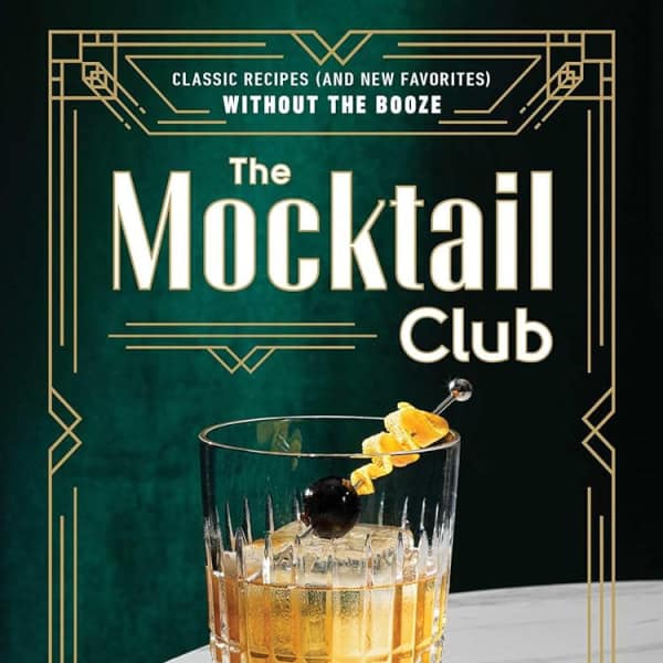 Book cover showing a cocktail glass with an orange garnish on a green background