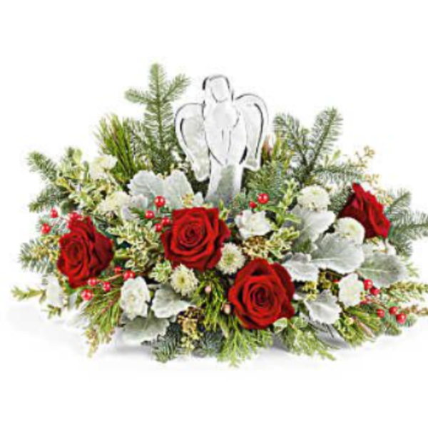 Red roses and white flowers arranged with an angel ornament