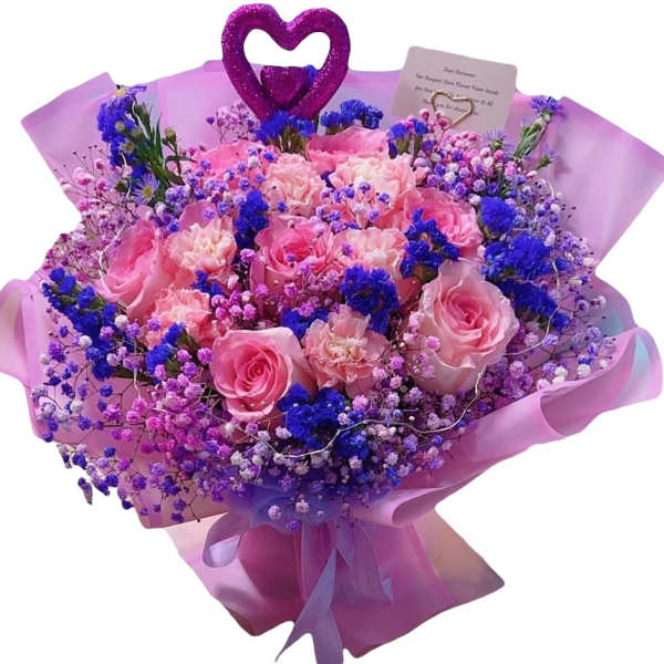 Bouquet of pink roses and purple filler flowers wrapped in pink paper