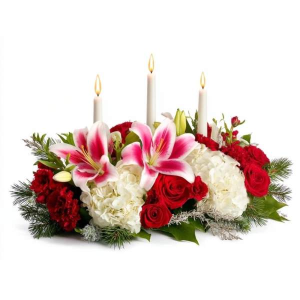 Floral centerpiece with pink lilies, red roses, white hydrangeas, and three candles