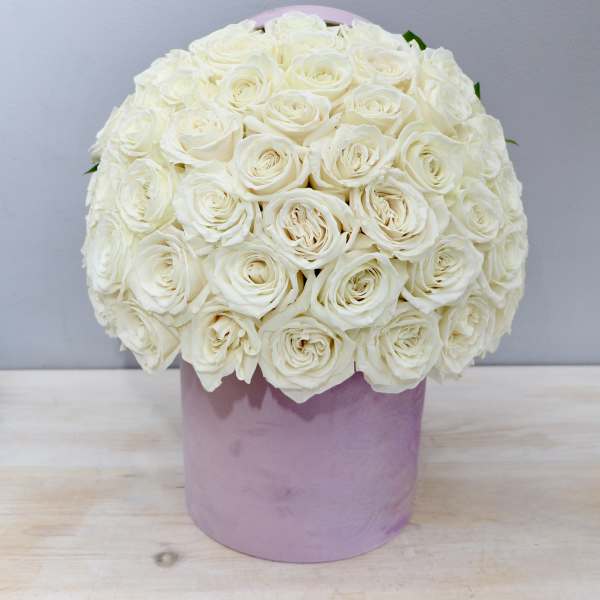 White rose bouquet in a lavender hat box