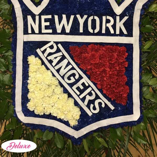 Floral New York Rangers logo arrangement with red, white, and blue flowers